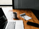 laptop developing with cup of coffe